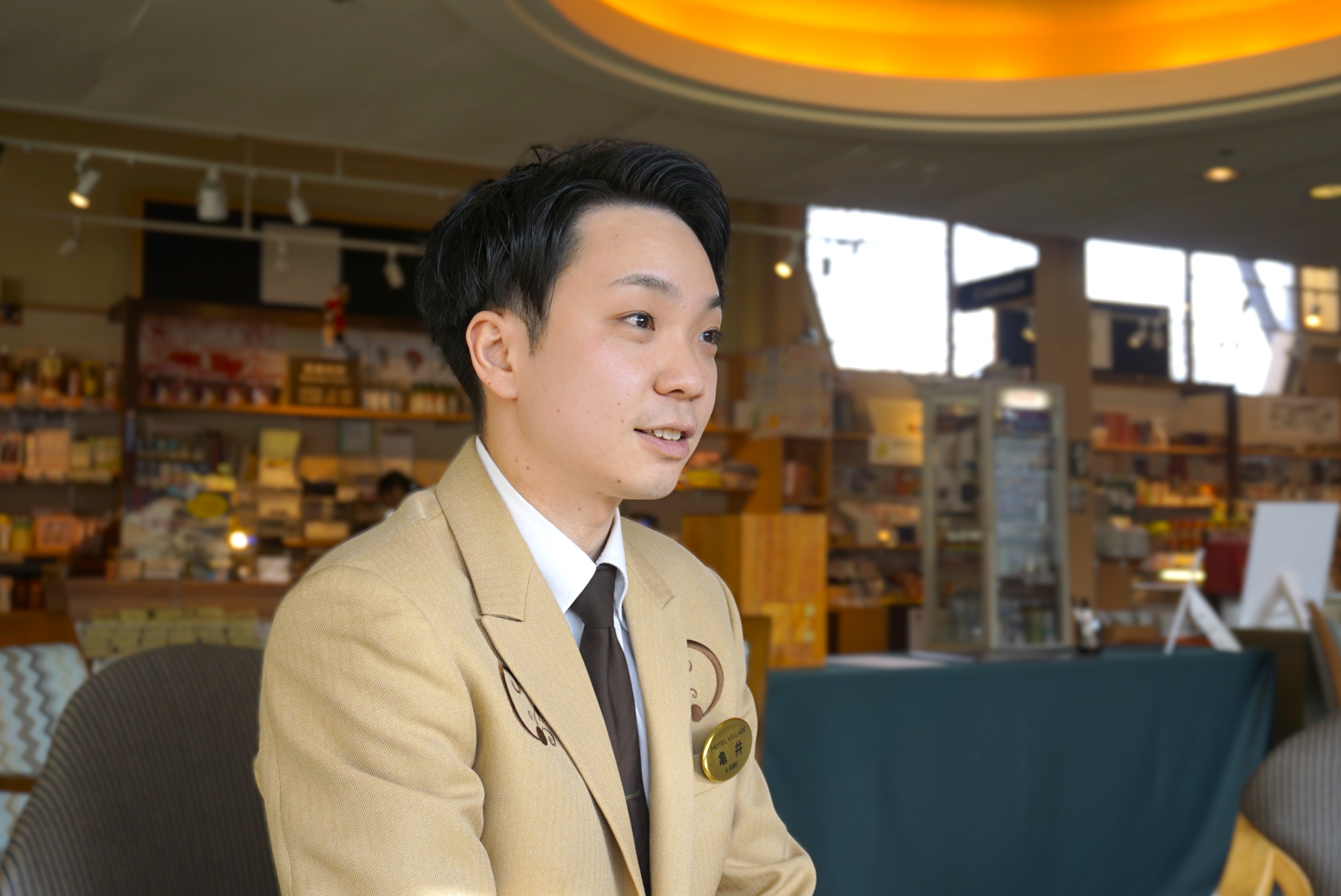 フロント亀井さん