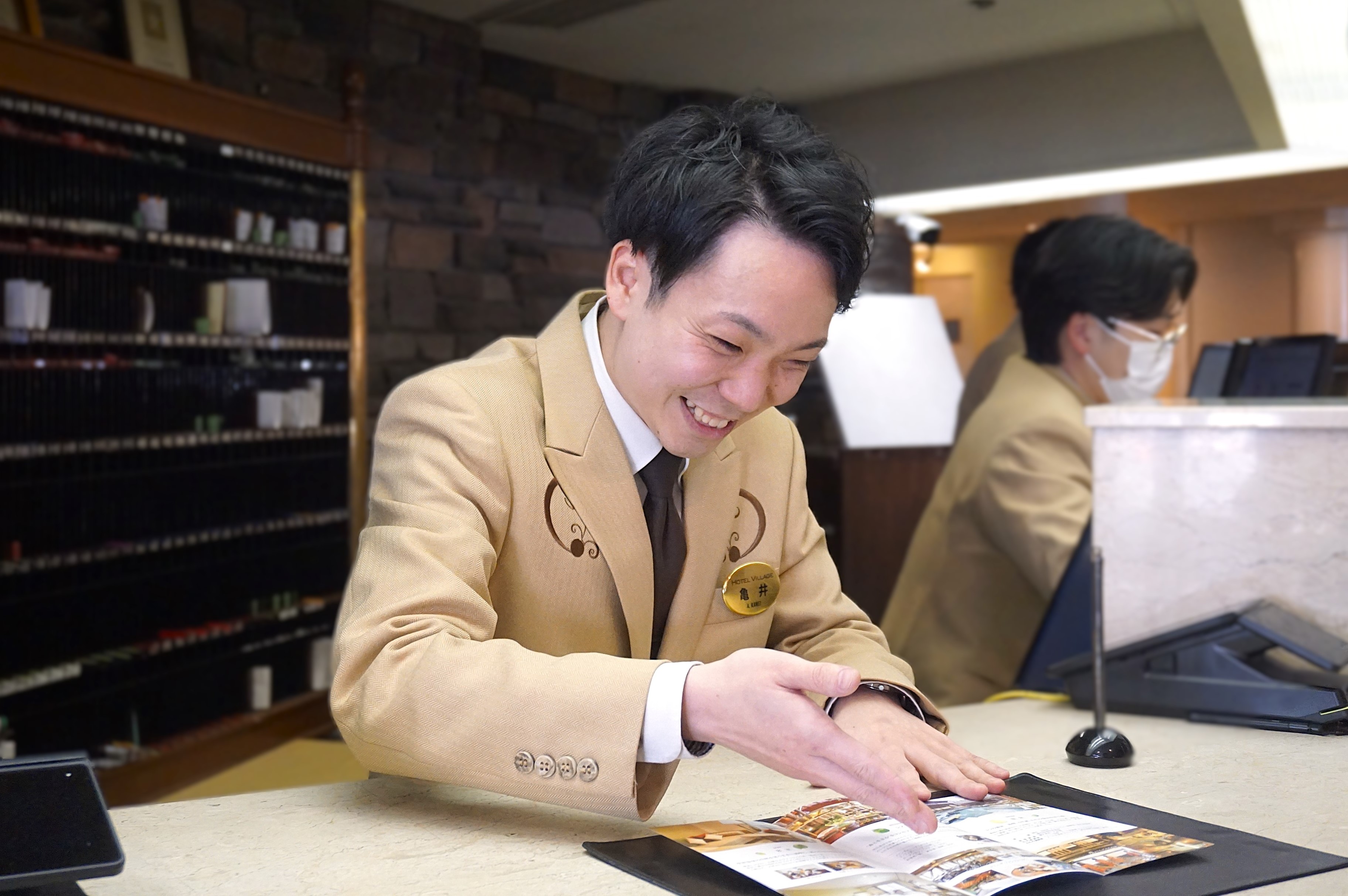 フロント亀井さん